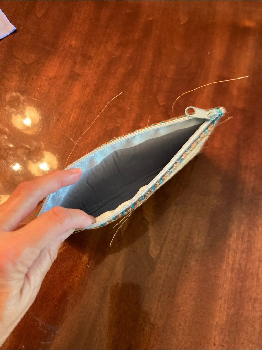 Handcrafted Natural Hair-On Hide Clutch with Turquoise Stitching